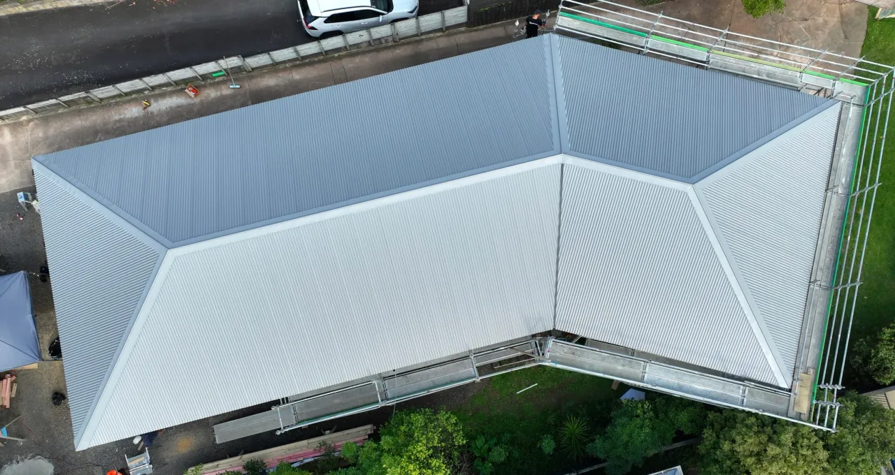 aerial of a large silver metal roof on a home